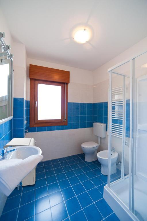 Residence Galleria Gran Madò Caorle Habitación foto